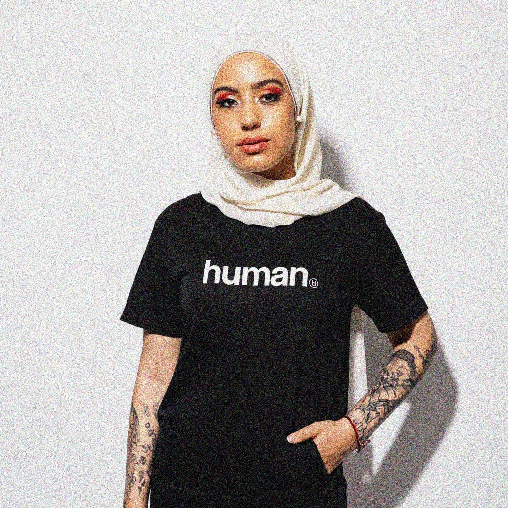 HUMAN TEE